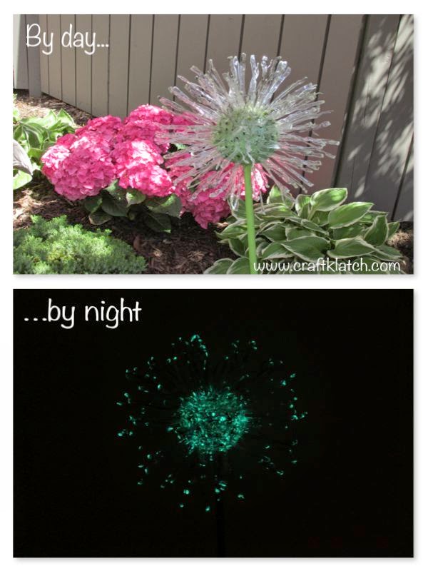 Recycled dandelion yard art. View by day and glow-in-the-dark by night.