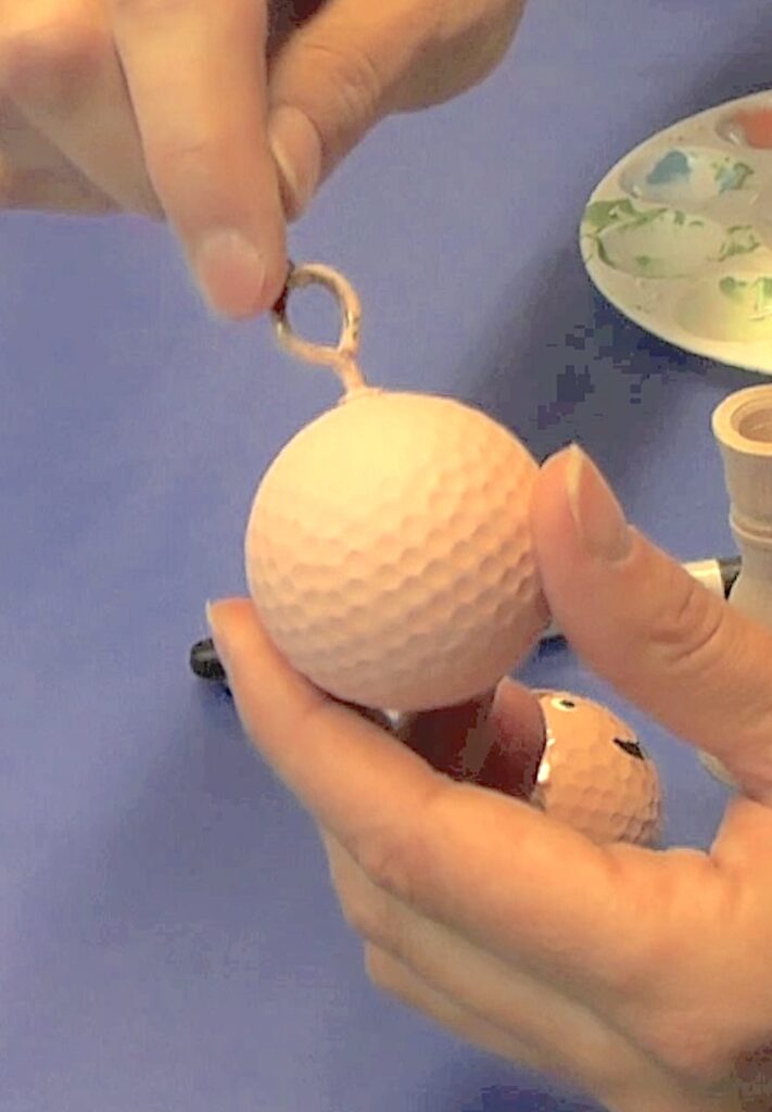 Flesh painted golf ball with eyescrew 