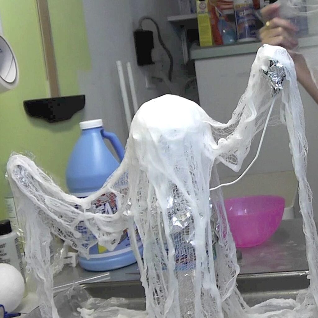 The first layer of cheesecloth ghost will look sparse
