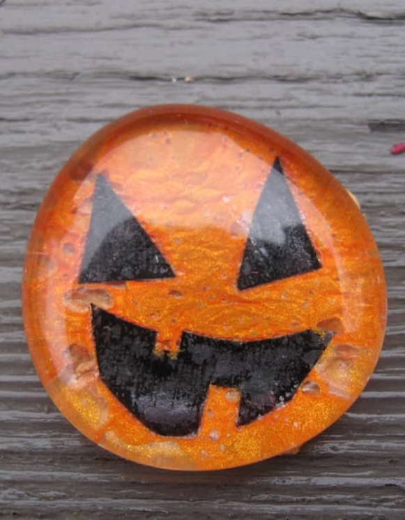 Halloween nail polish craft, while the nail polish was wet, I added orange tissue paper for texture