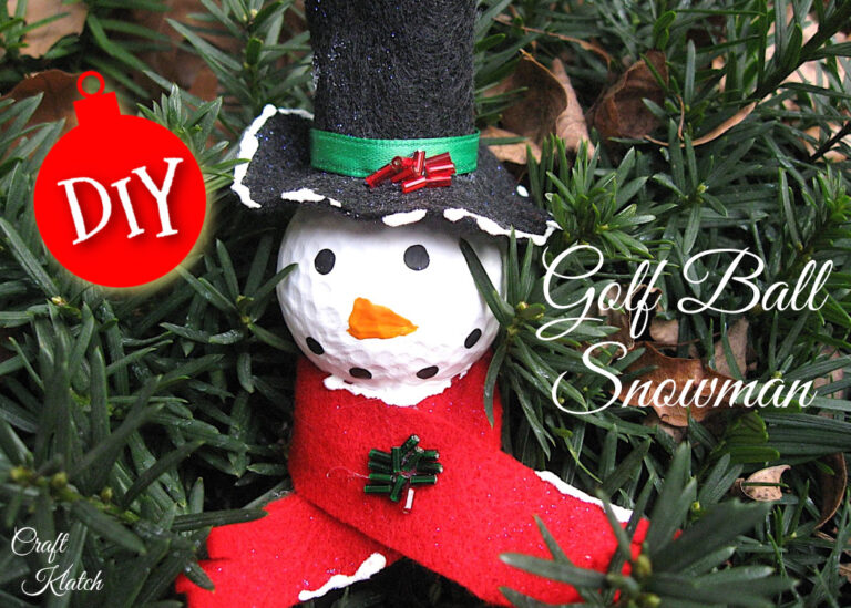 Golf ball snowman ornament craft with red scarf and black hat