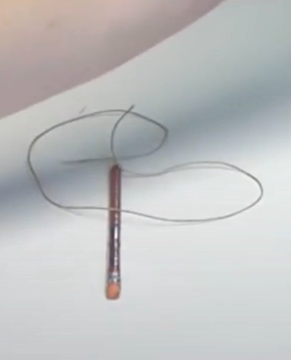 Pencil on a string