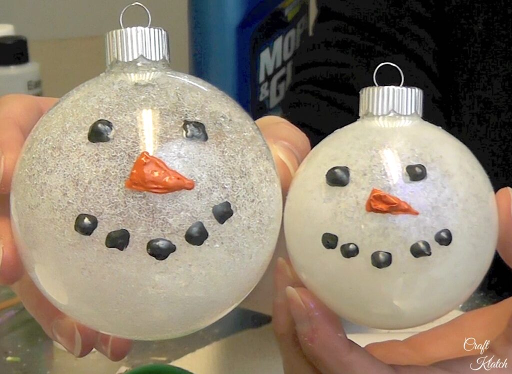 Finished glittered snowman ornaments