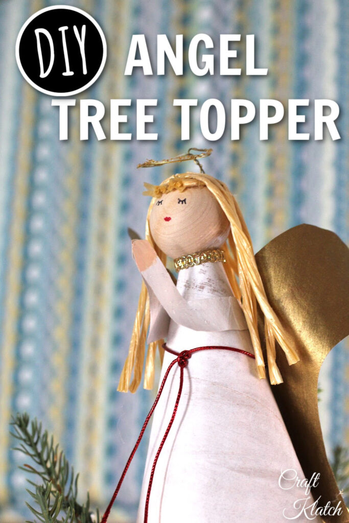 Angel tree topper with praying hands 
