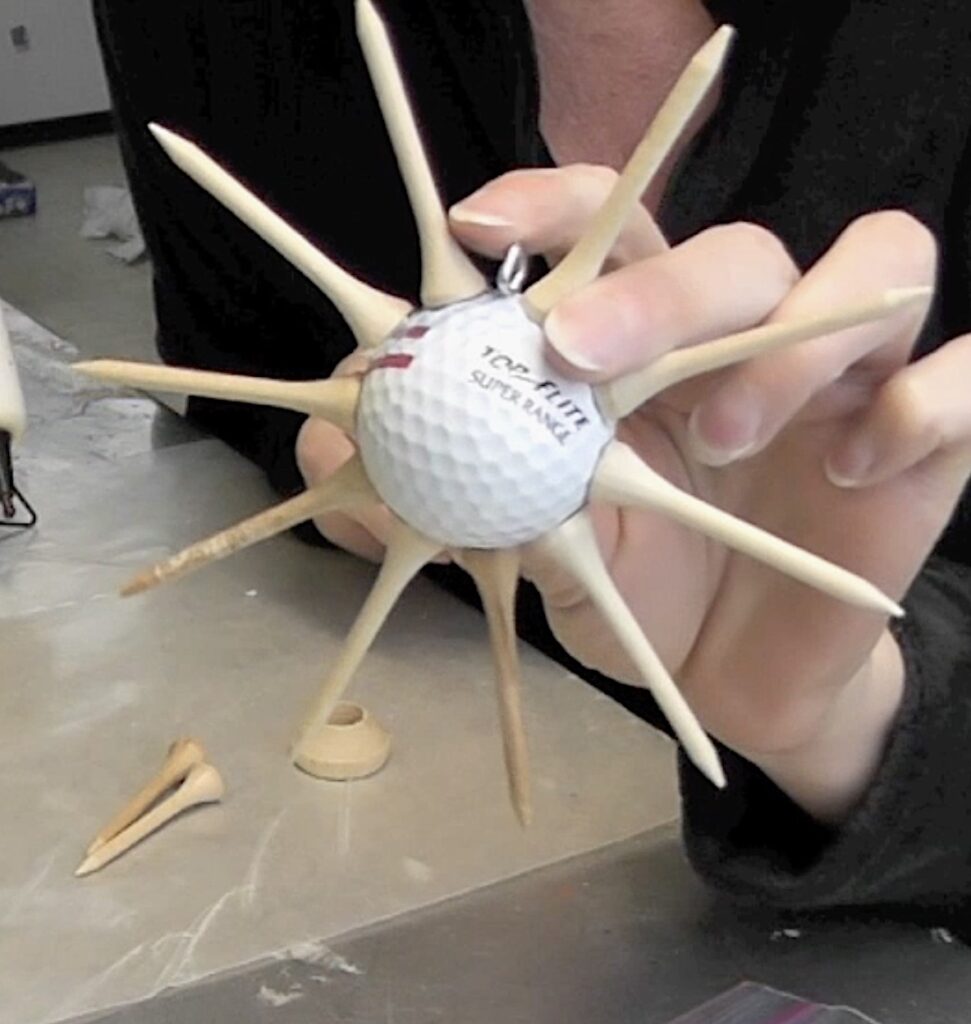 Unpainted golf ball sun craft