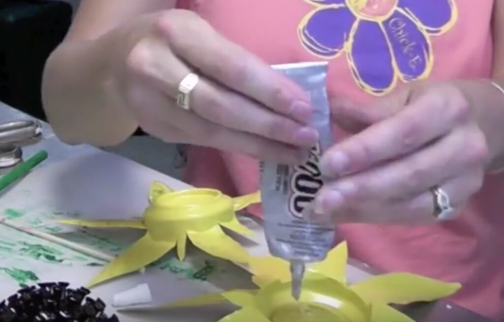 Squeeze glue into the inside of the yellow flower