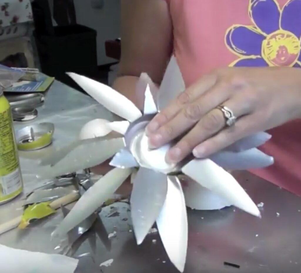 Press the two cut flowers together