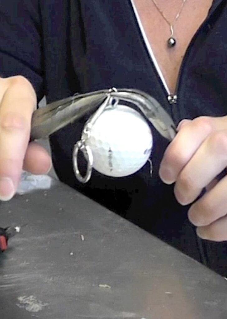 Attach keychain finding to golf ball