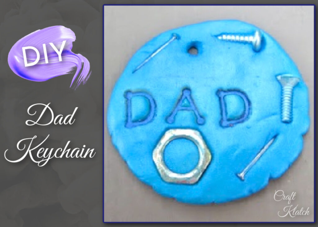 Round, blue Dad keychain with nuts and screws embedded