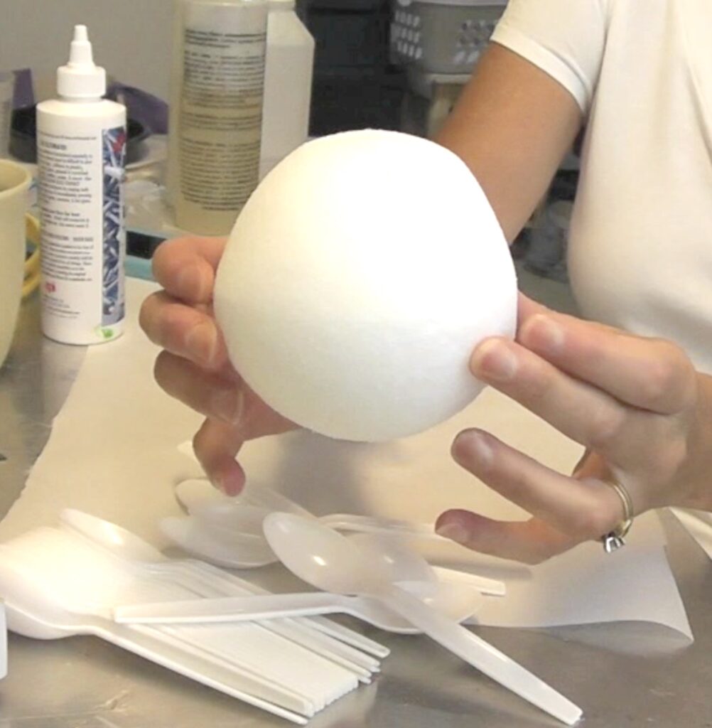 Styrofoam ball pressed into oval for an artichoke shape
