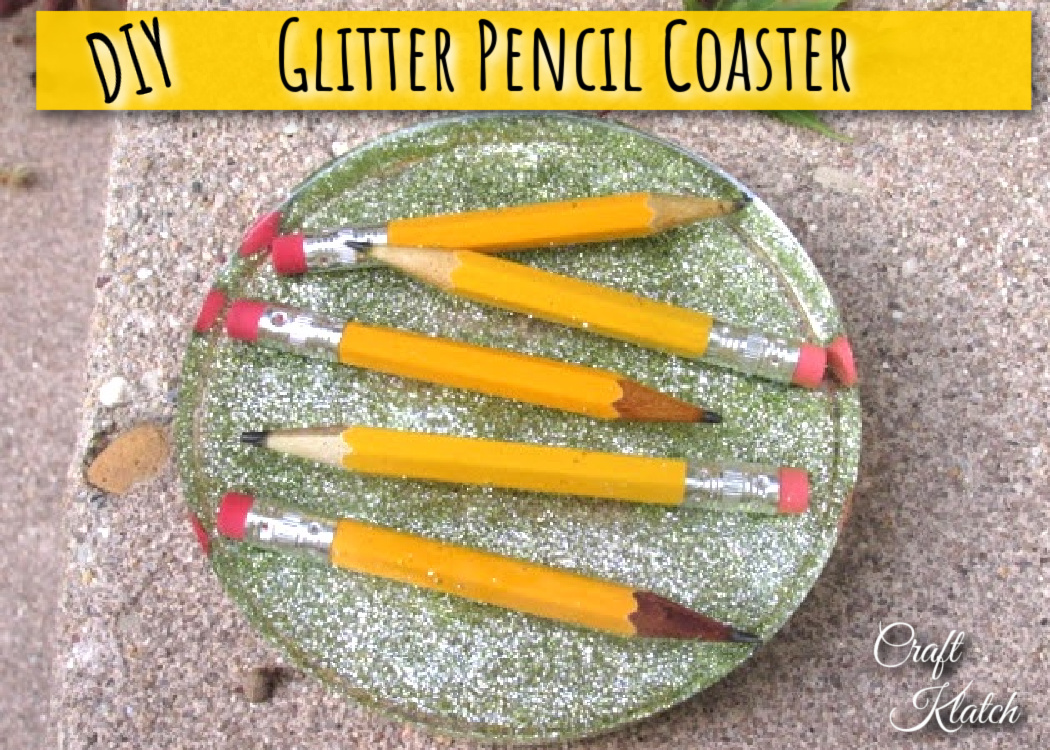 Green glitter and pencils resin coaster for back to school diy