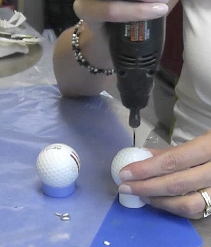 drill hole into golf ball