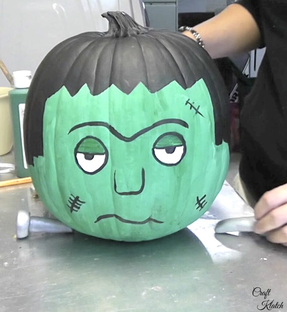 Add polymer clay bolt to the Frankenstein pumpkin for a pumpkin decorating no carve project