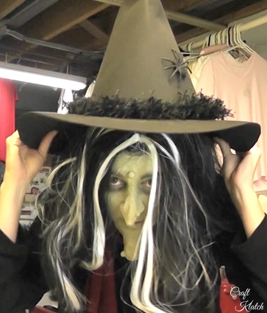 Add witch hat to finish the Halloween costume