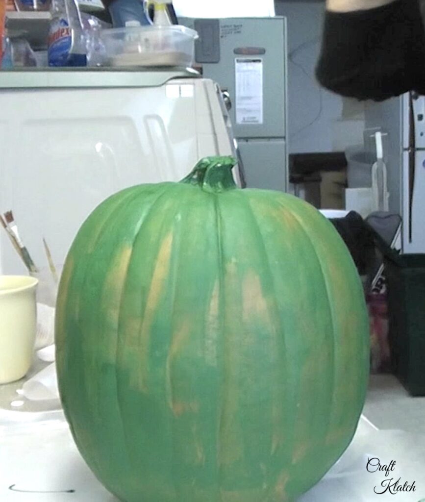 Green painted pumpkin is the base for the pumpkin decorating no carve project