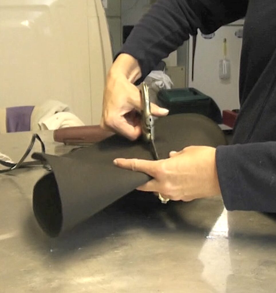 Fold foam in half and cut out center
