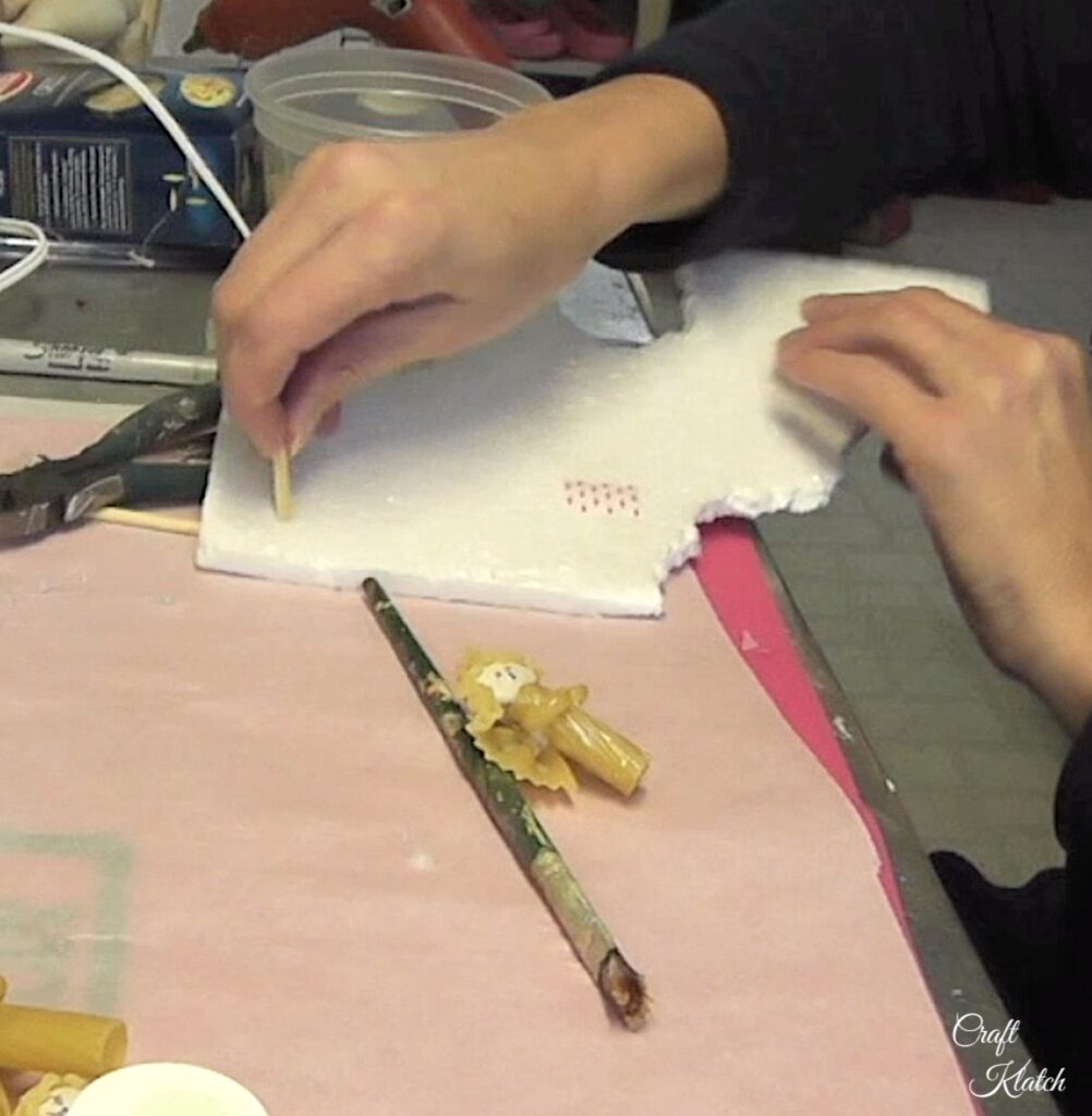 Use a piece of styrofoam and a stick to create a pasta angel dryer