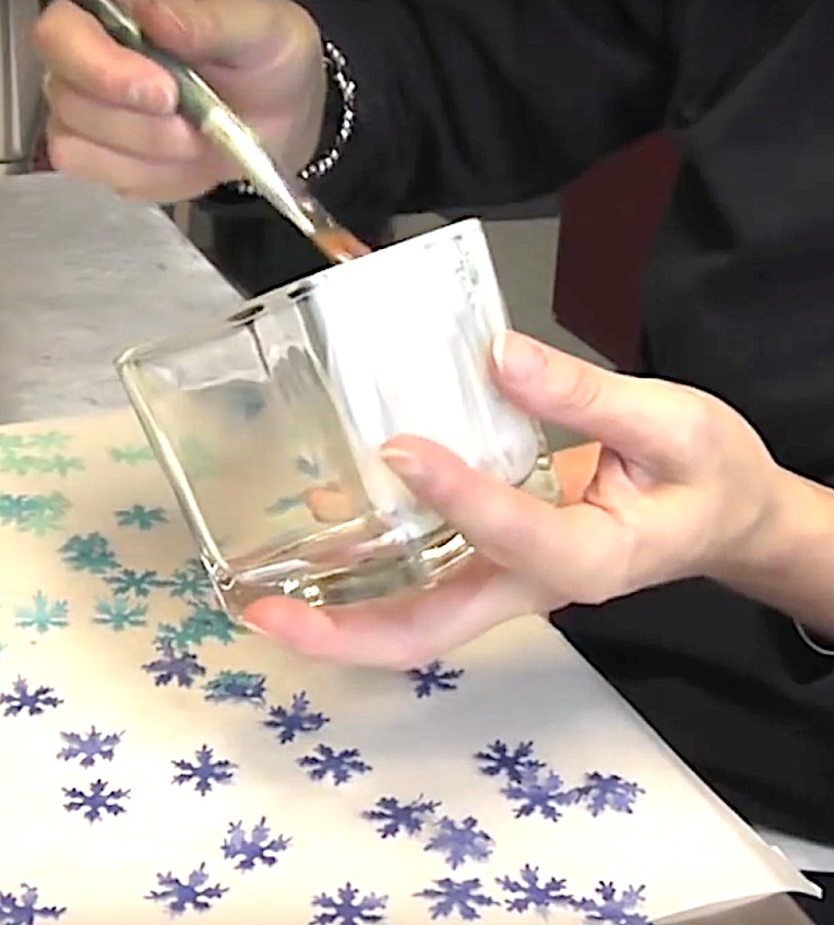 To make snowflake votives brush Mod Podge on the inside of the square votives