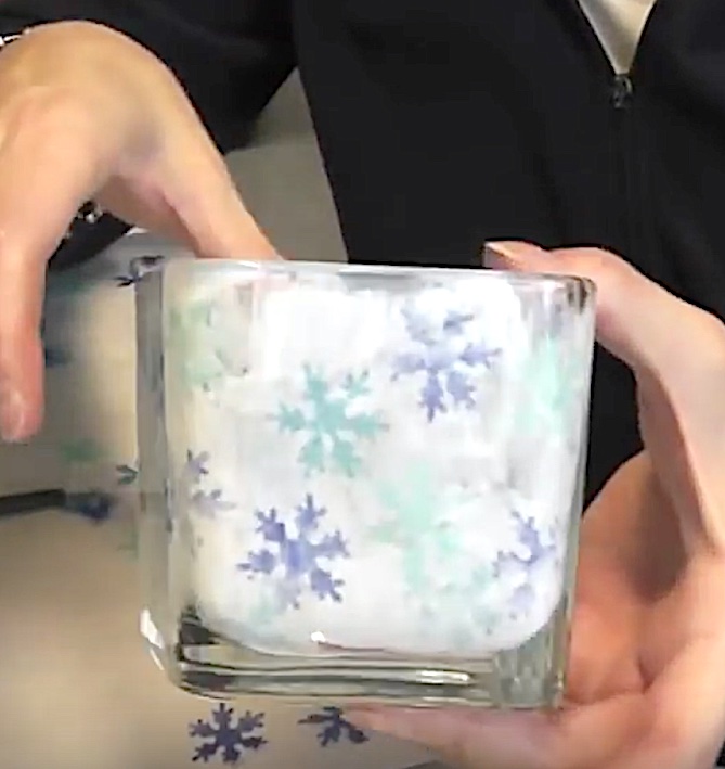 How to make snowflake decorations you have mod podge and snowflake cut outs inside the glass votives