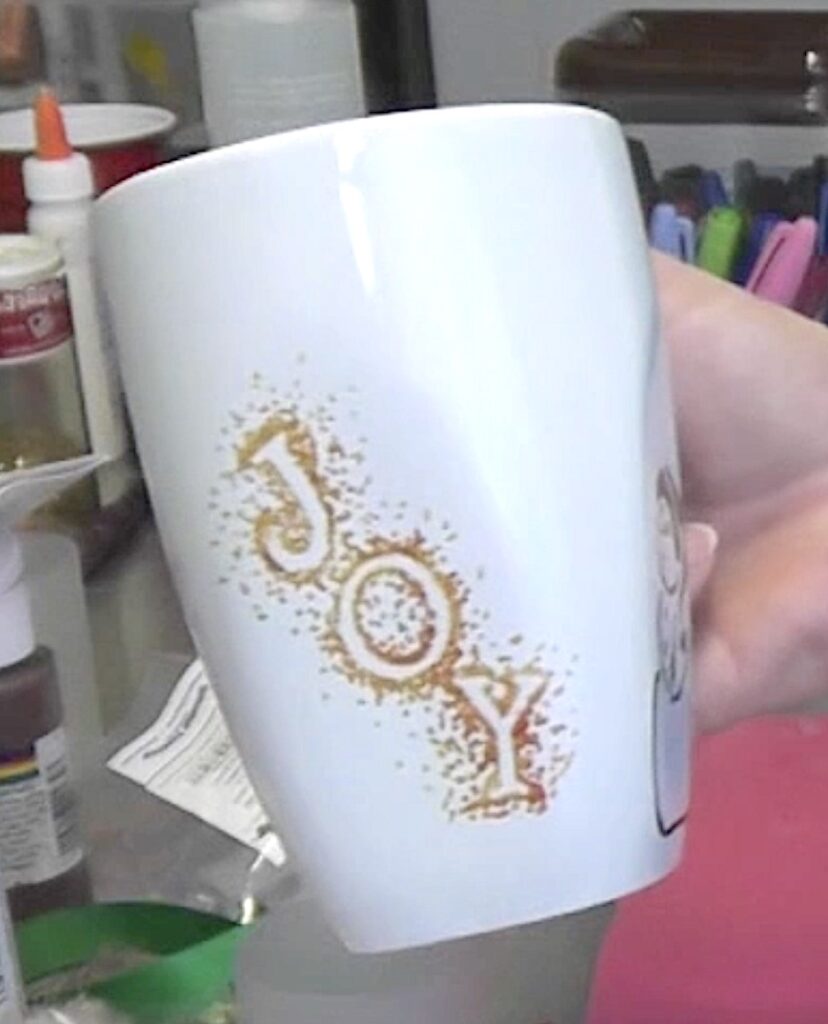 JOY with dots on side of snowman mug