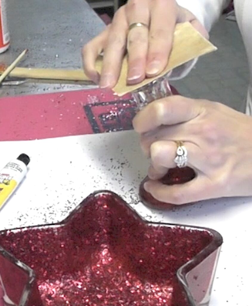 Use sandpaper to rough up the candlestick and bottom of the star candy dish