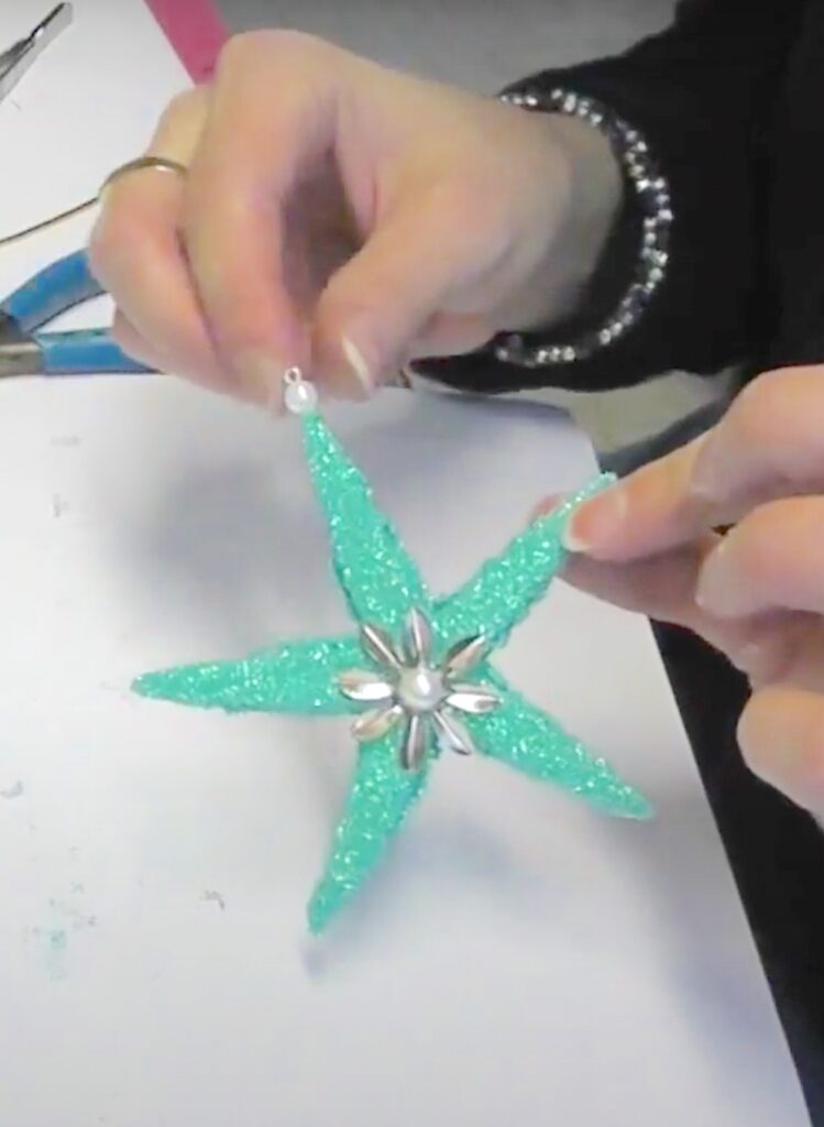 Add pearl to the starfish coastal ornament