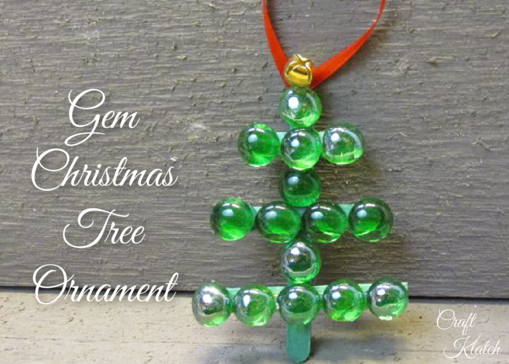 Green glass Christmas tree ornament