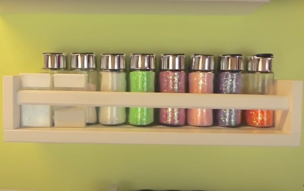 Glitter jars in spice rack