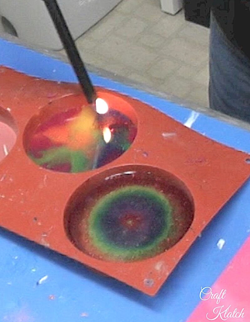 Pop bubbles in resin with lighter