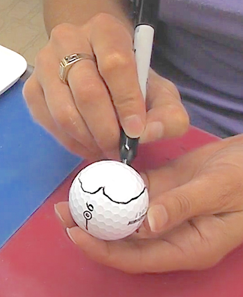 Draw a heart on the golf ball