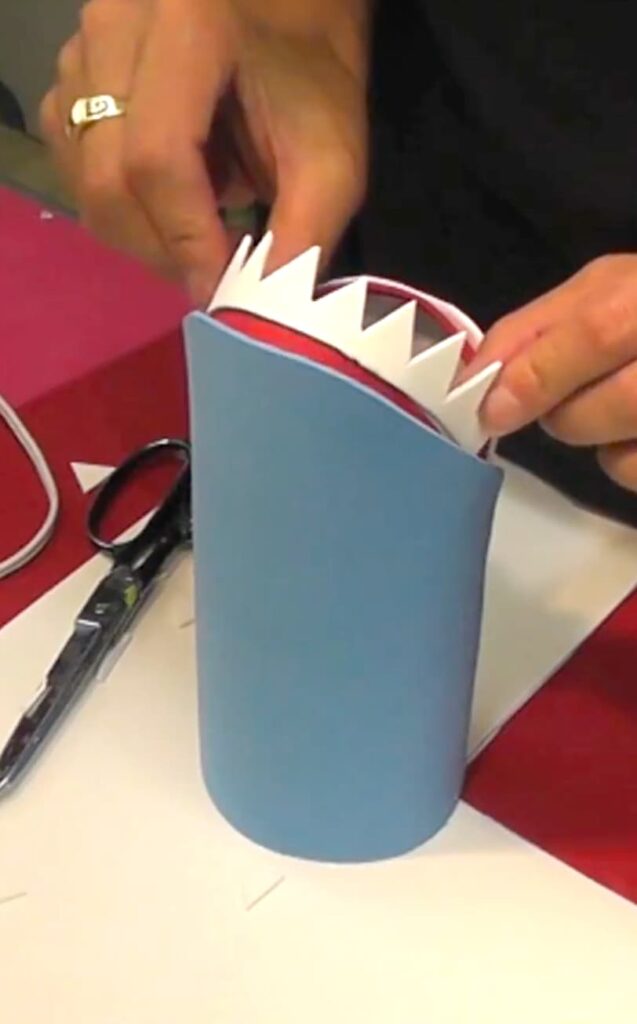 attaching the foam teeth to the shark craft