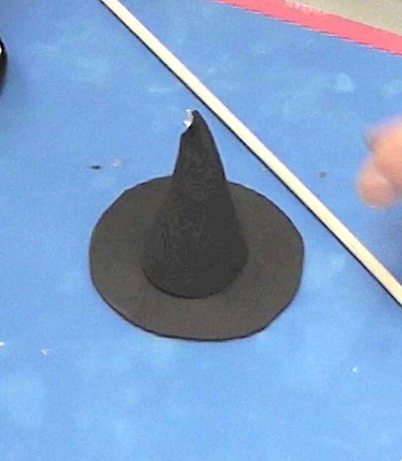 Glue foam witch hat together