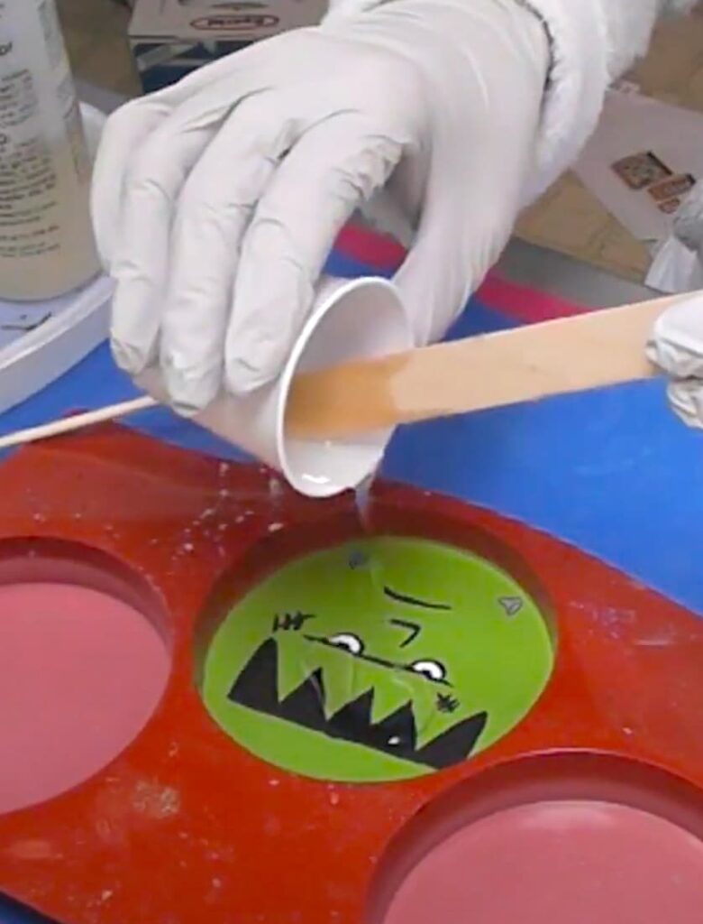 Pouring resin over the Frankenstein art coaster