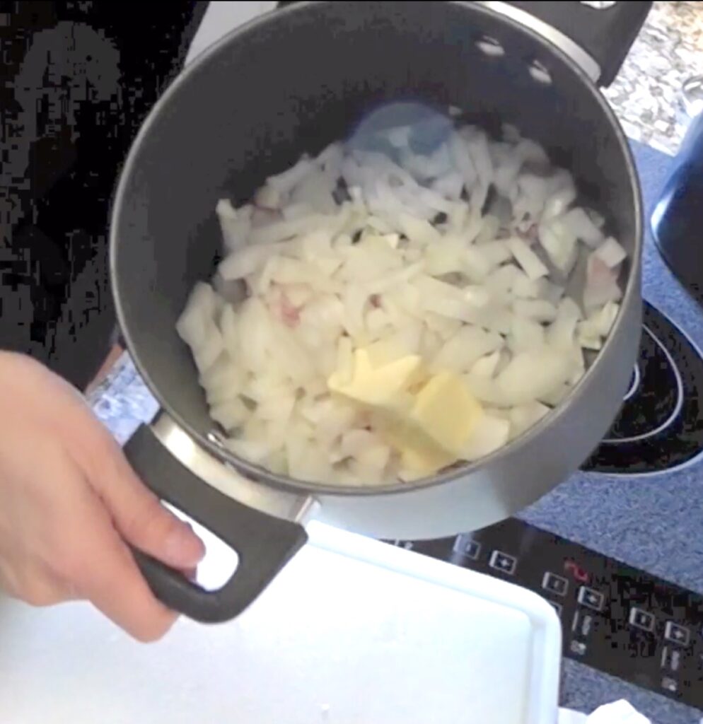 Onions, butter and bacon in cooking pot
