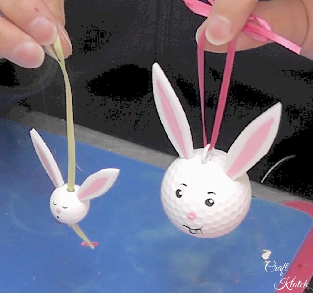 Finished golf ball bunny and small bunny made from a bead