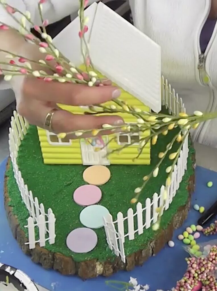 Using E6000 to glue panels of the easter bunny house craft together