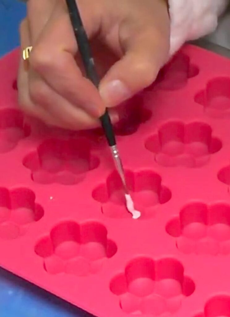 painting in the center of the pink silicone flower mold