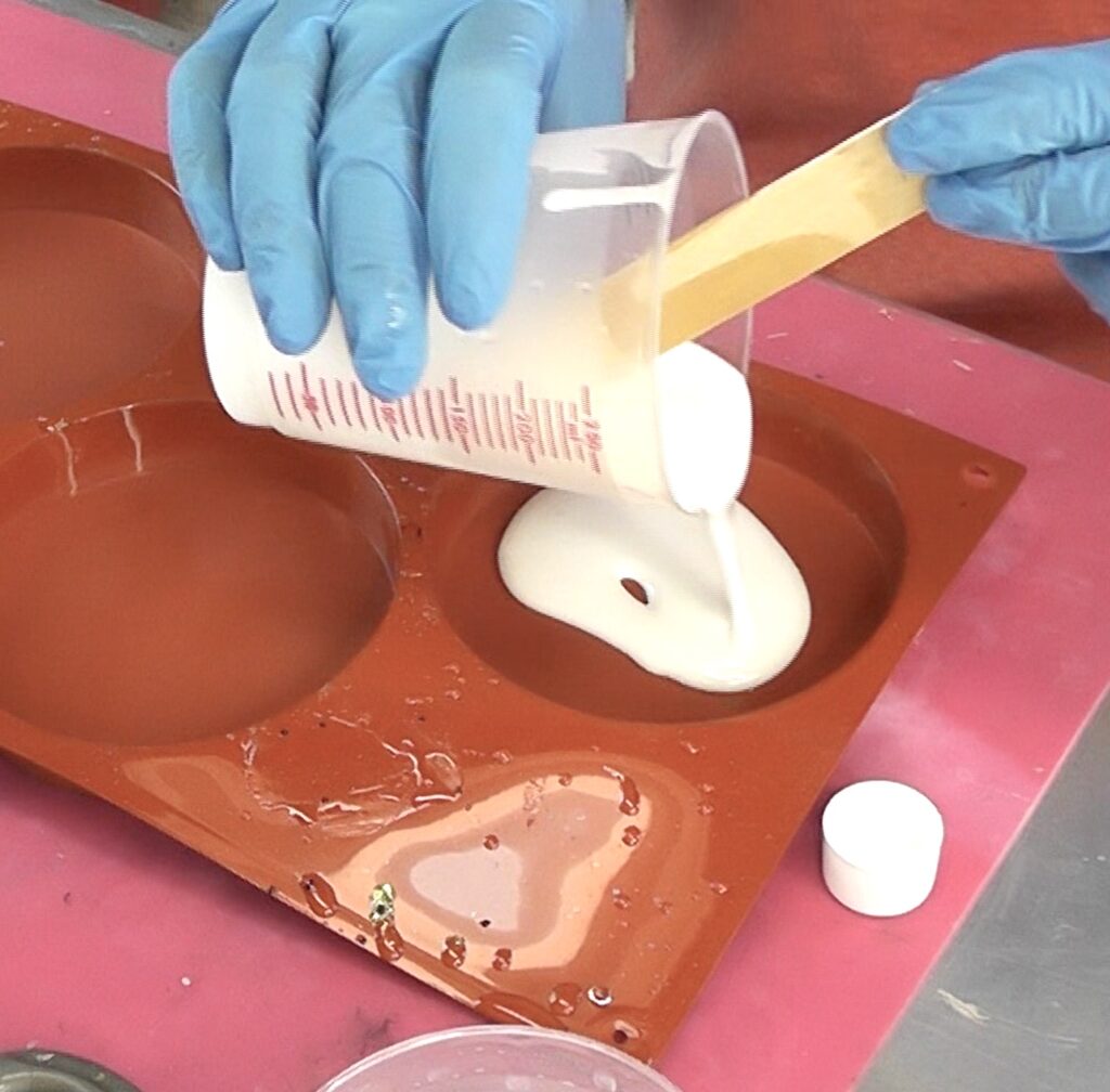 Pour white resin into coaster mold