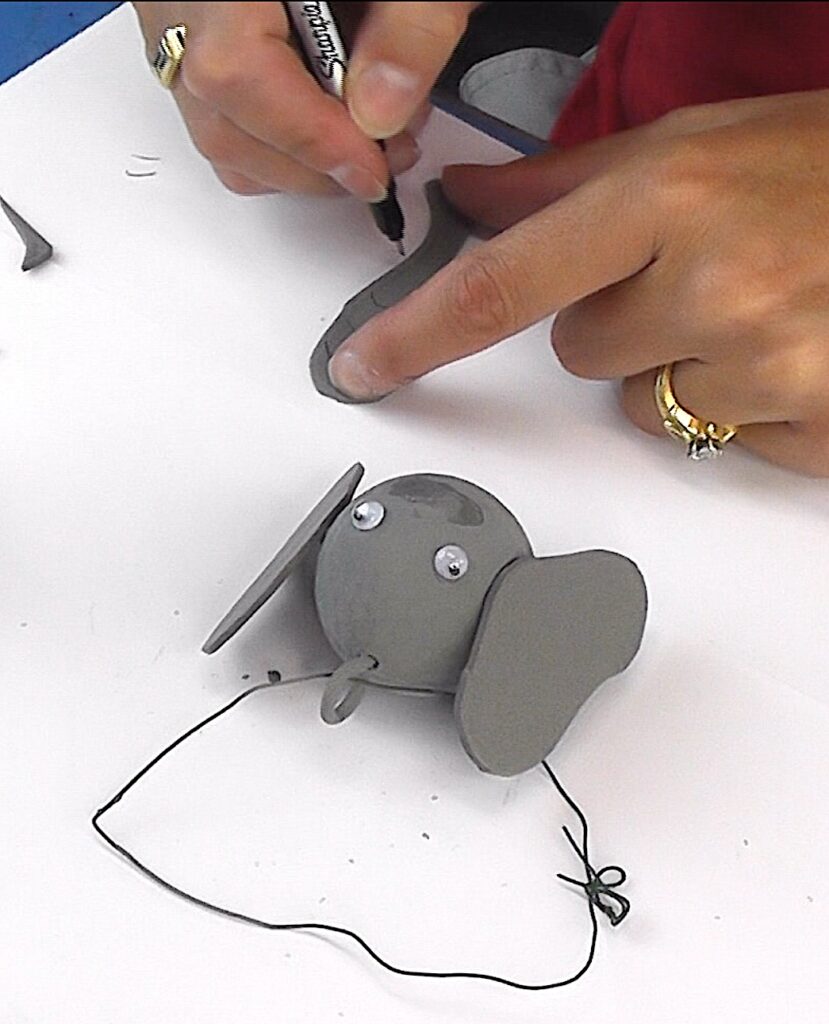 Draw on bend marks for elephant trunk