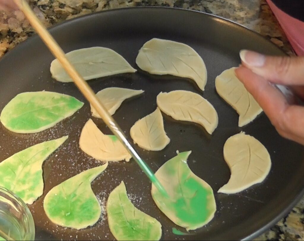 Brushing leaves with green food color