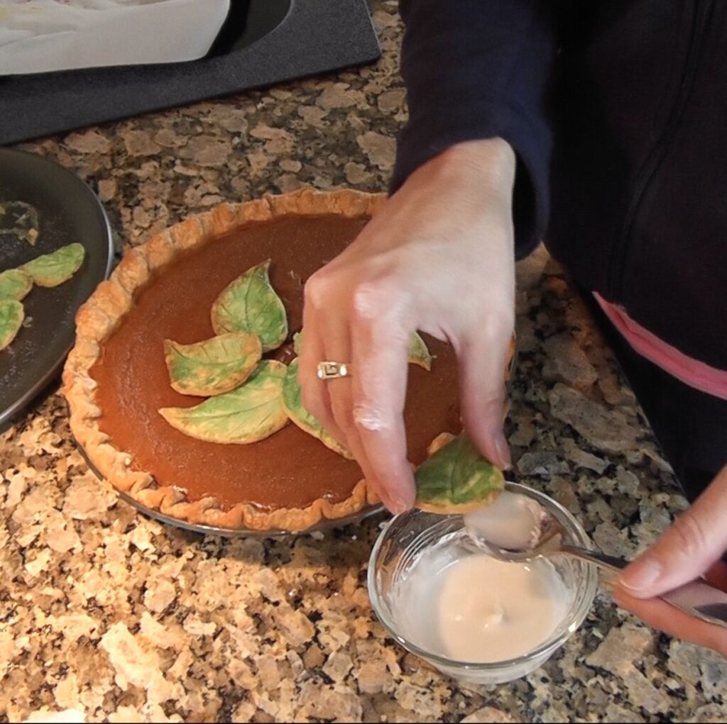 Dipping dough leaf in sugar water mixture