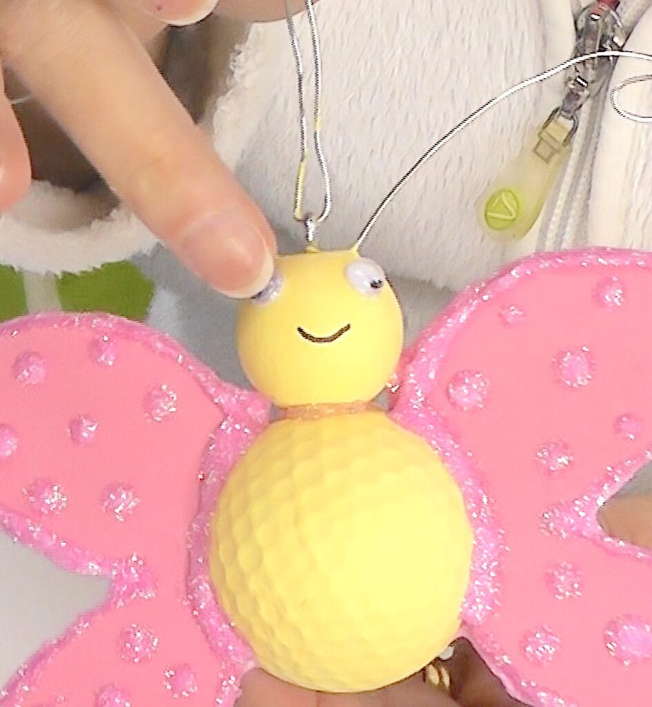 Glue on google eyes to the cute butterfly