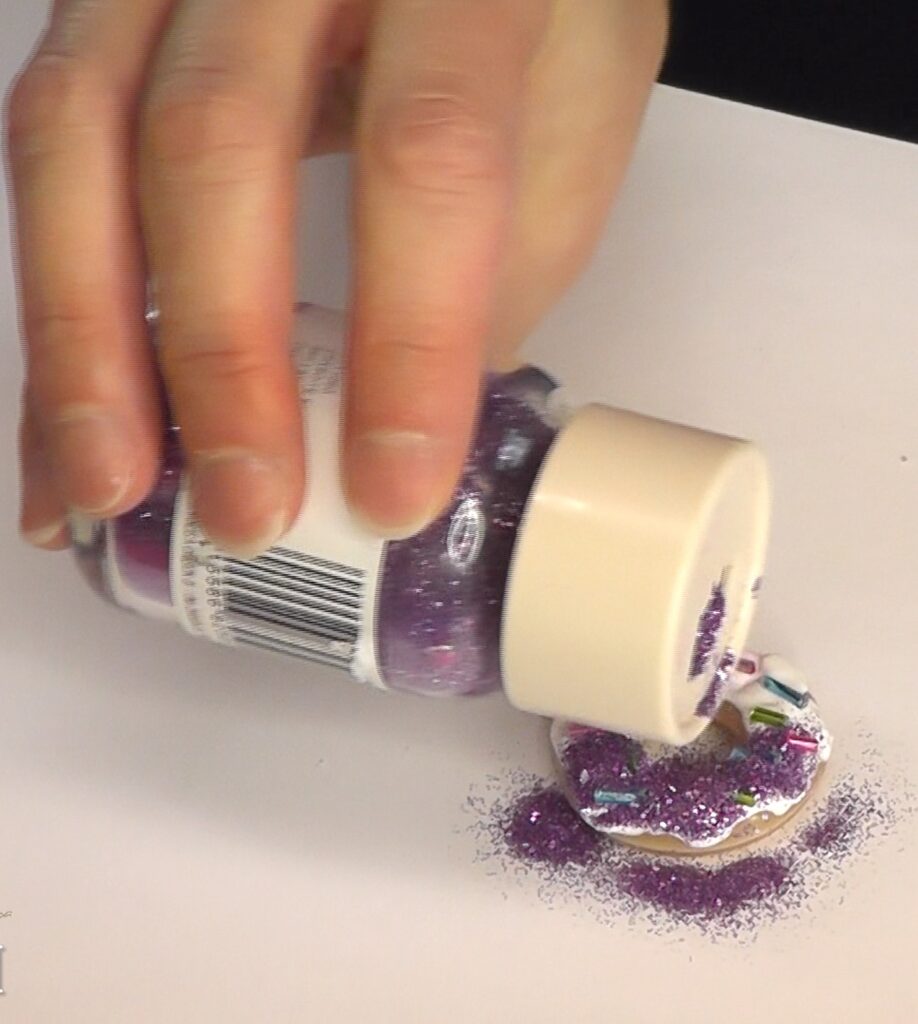 How to make donuts with colored frosting, and bugle beads and purple glitter with glue