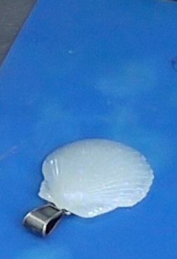 Gluing the glow in the dark jewelry to the jewelry bail