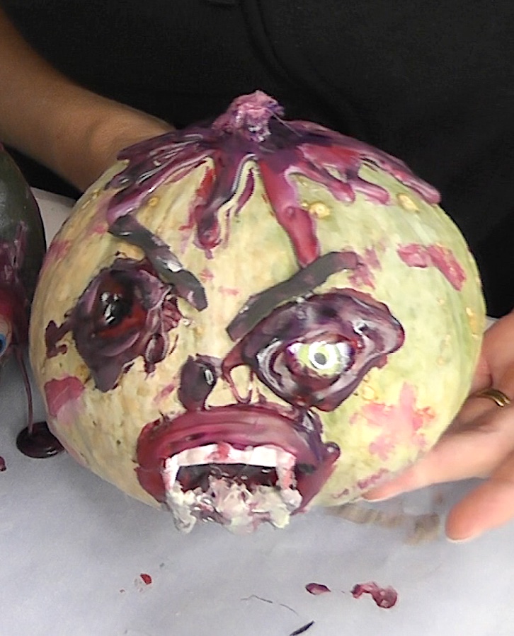 Halloween painted pumpkins zombie style