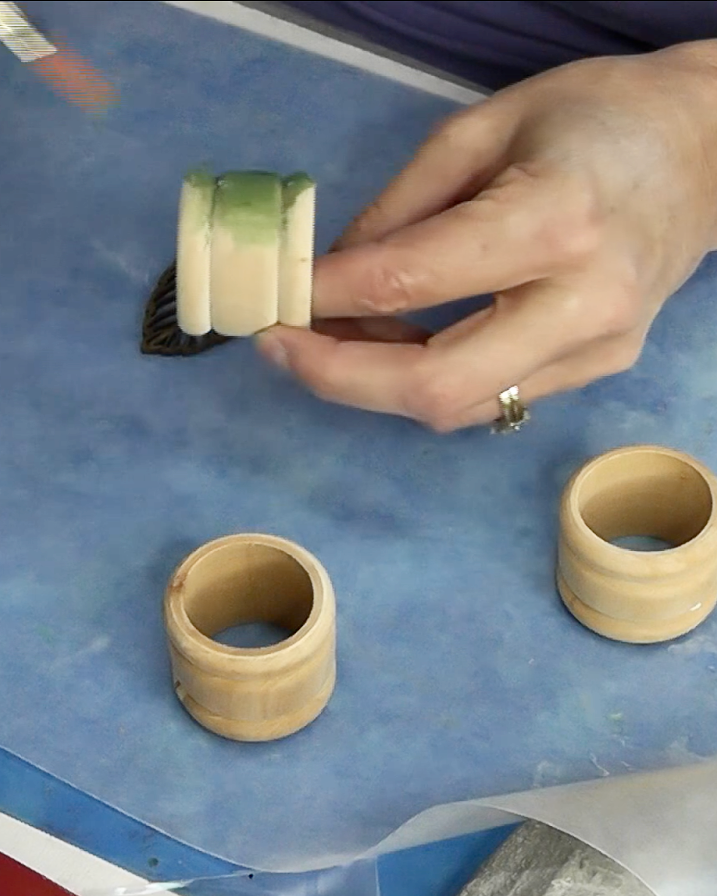 Painting napkin rings green