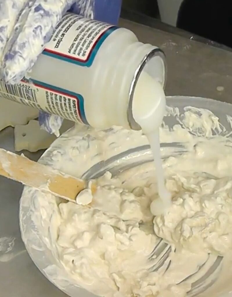 Adding Mod Podge to the clay concoction to make faux icing for the easy sugar cookie christmas coasters