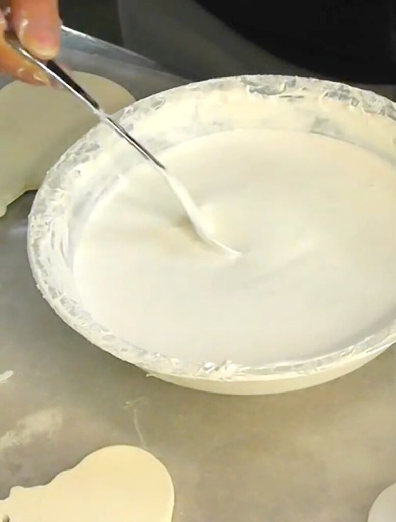 Mixing faux icing the the easy sugar cookie craft