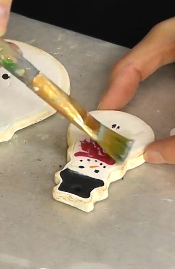 Sealing the snowman cookie coaster