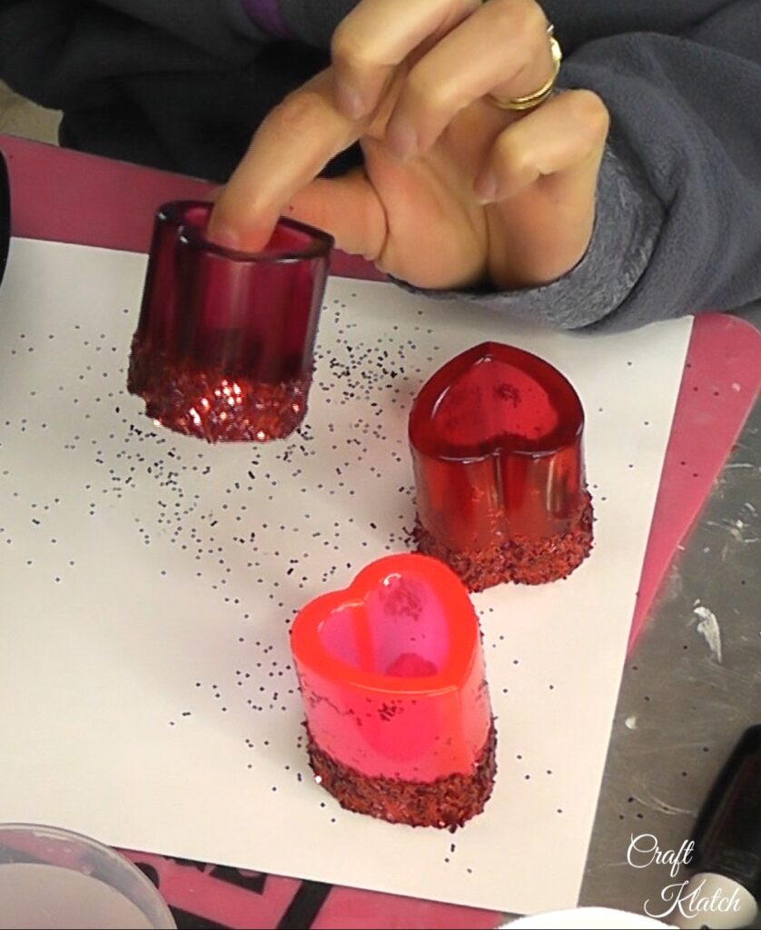 Resin hearts with red glitter bottoms
